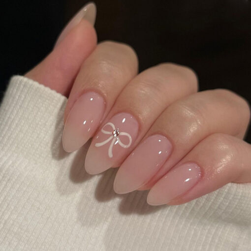 Minimalistische Nude Press On Nails Elegante Almond Nägel mit Weißer Schleife – Bild 2